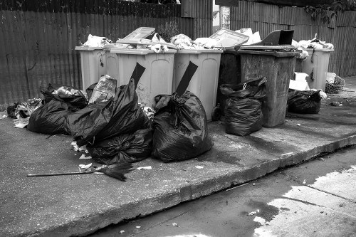 Hoarder clearance team assessing a cluttered home in Chingford