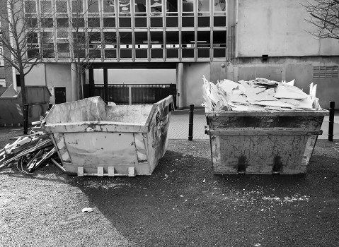 Hoarder clearance team sorting belongings in a Cubitt Town residence