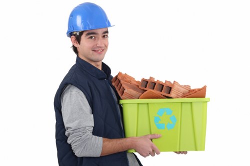 Team member organizing clutter in a living room