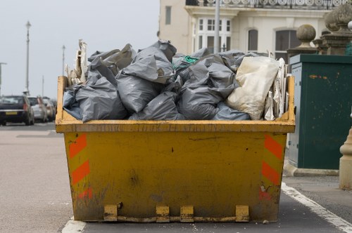 Safety precautions during hoarder clearance in Woolwich home