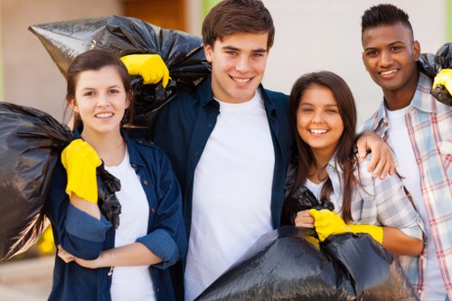 Hoarder clearance professionals sorting items