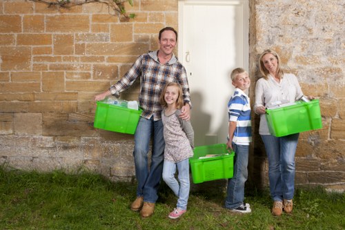 Compassionate hoarder clearance professionals assisting a client