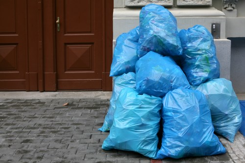 Professional hoarder clearance team assessing a cluttered home in Barnes Cray.