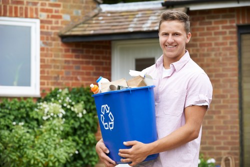 Professional disposing of a refrigerator