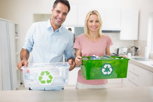 Hoarder clearance experts safely removing items from a residence in Watford