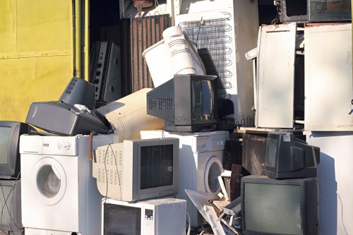 Experts organizing and cleaning after hoarder clearance