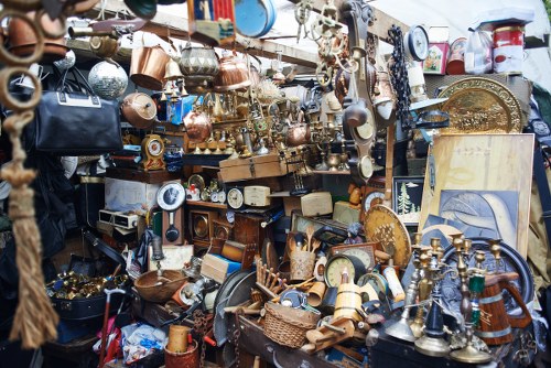 Hoarder clearance team safely removing items from a property